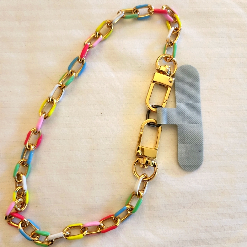 Colorful Chain Link Bracelet. The Gray Piece Goes Inside Your Cell Phone Cover.